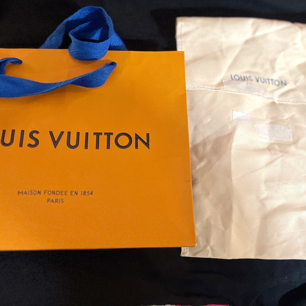 Louis Vuitton Bold Orange Bag with Blue Handles